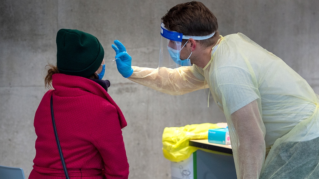 A swab is taken at a pop-up COVID-19 testing site on the Dalhousie University campus in Halifax on Wednesday, Nov. 25, 2020. THE CANADIAN PRESS/Andrew Vaughan