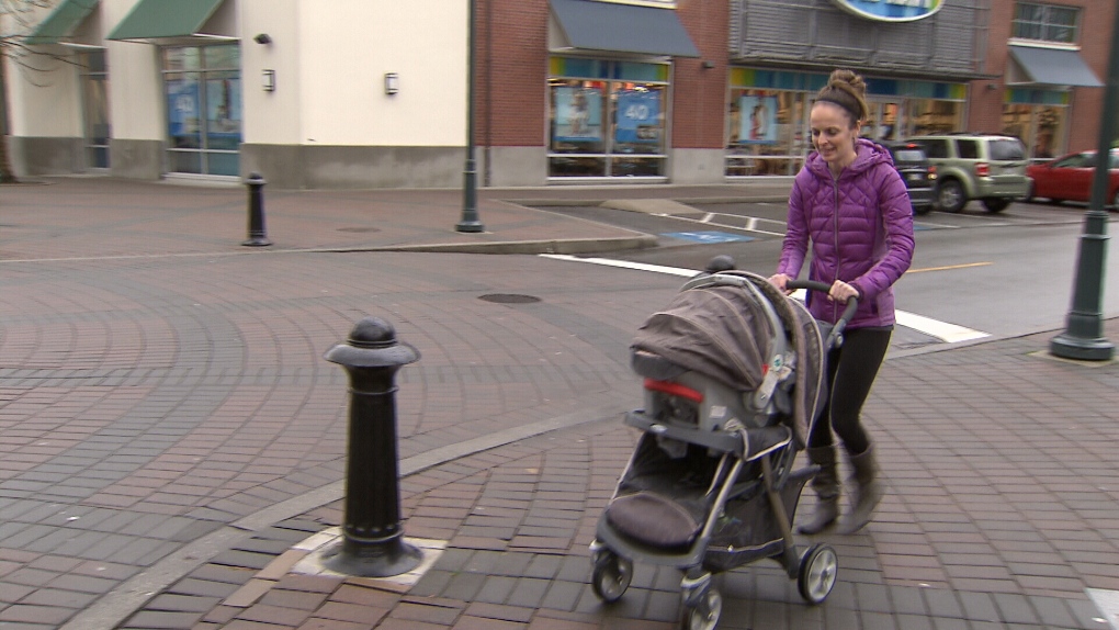 Mom pushing stroller in West Vancouver 