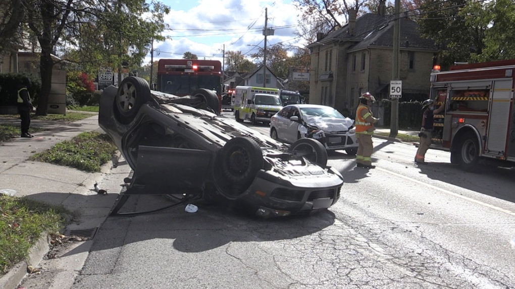 A vehicle rests on it roof after a three-vehicle crash in London, Ont. on Tuesday, Nov. 2, 2021. (Gerry Dewan / CTV News)