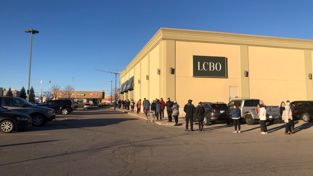 Several people line up hoping for free COVID-19 test kits on Friday, Dec. 17, 2021. (Justin Zadorsky / CTV London)