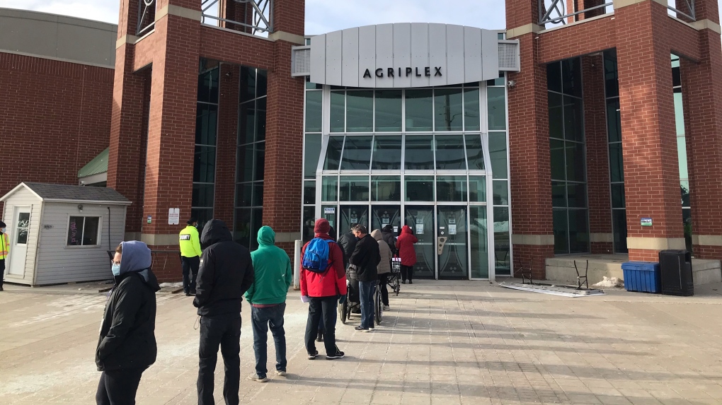 Those waiting for their appointment to receive the COVID-19 vaccine lineup outside the Western Fair District Agriplex in London, Ont. on Friday, March 5, 2021. (Sean Irvine / CTV News)