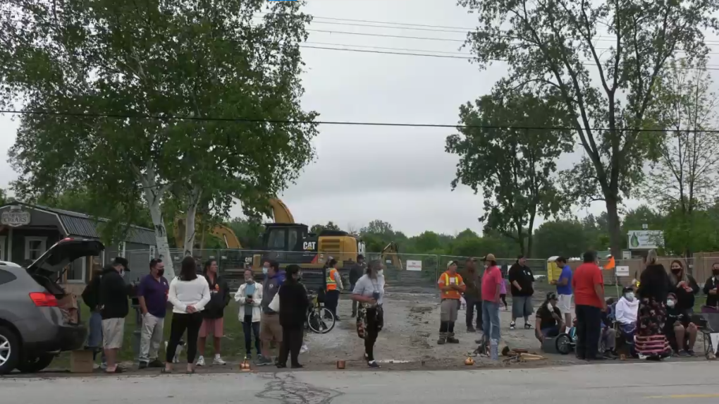 Protesters opposed to a new gas station rally on Aamjiwnaang First Nation, Thursday, June 3, 2021. (Marek Sutherland / CTV News)