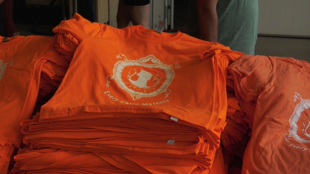 Orange shirts are ready for people to pick up at the Covent Garden Market in London, Ont. on Wednesday, June 30, 2021. (Jaden Lee-Lincoln / CTV News)