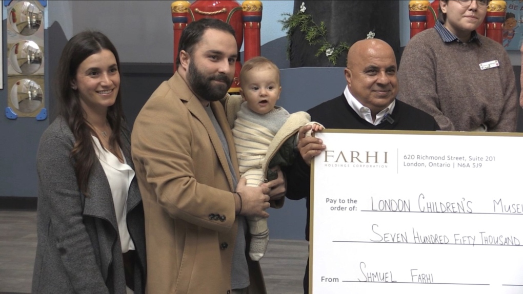 Shmuel Farhi and family make a donation to the London Children’s Museum on Dec. 8, 2022 in London, Ont. (Daryl Newcombe/CTV News London)