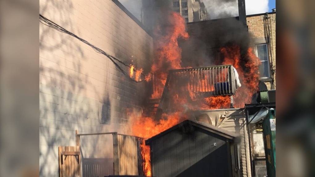 A fast moving fire spread to the exterior of a building located at Dundas and Lyle Streets in London, Ont. on May 17, 2022. (Source: London Fire Department/Twitter)
