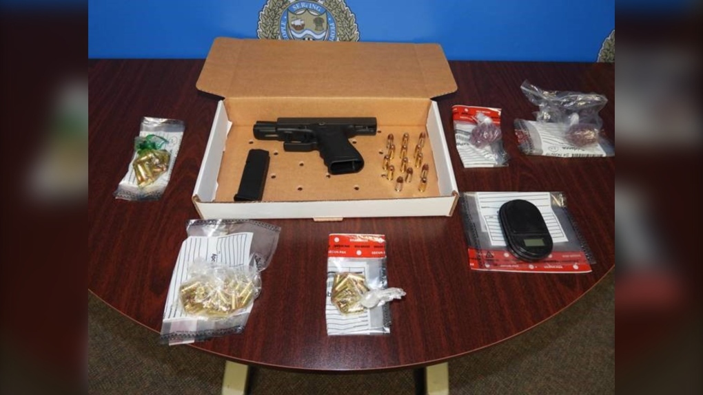 A handgun, ammunition and fentanyl were seized by Sarnia police after executing a search warrant on a suspect's vehicle on May 12, 2022. (Source: Sarnia Police Service)