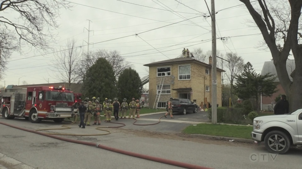 Fire crews battle an apartment fire on Thiel Street in London, Ont. on May 5, 2022. (Jim Knight/CTV London) 
