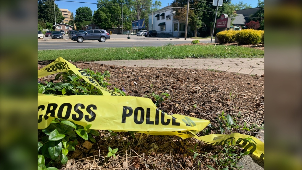 Police tape is seen near the intersection of Oxford Street and Richmond Street where police say a man was stabbed in the early morning hours of June 4, 2022. (Brent Lale/CTV News London)