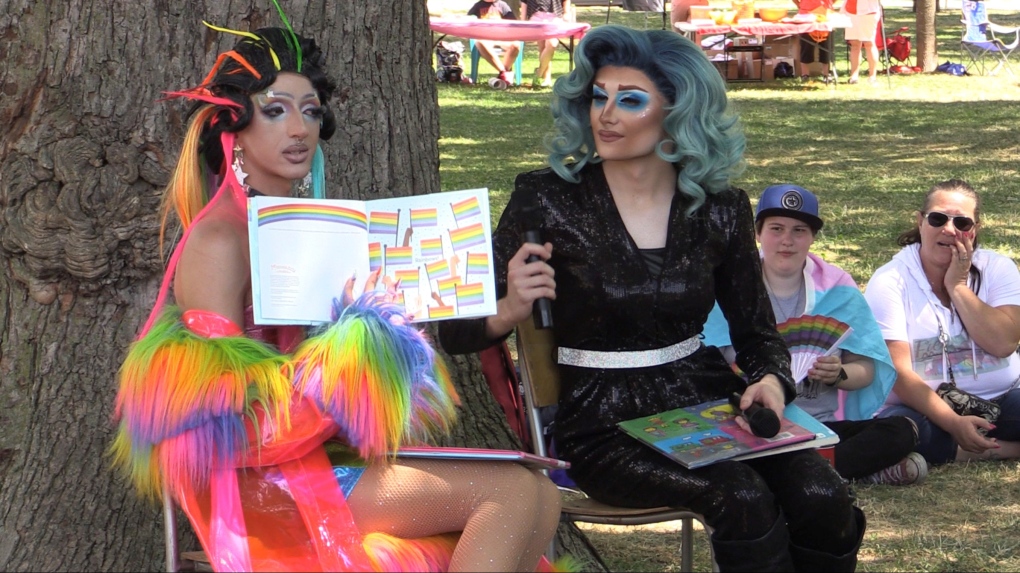 Galaxy Rose (L) and Miss Shaneen host Drag Queen Story Time during Wortley Pride on Saturday July 16, 2022. (Brent Lale/CTV News London)