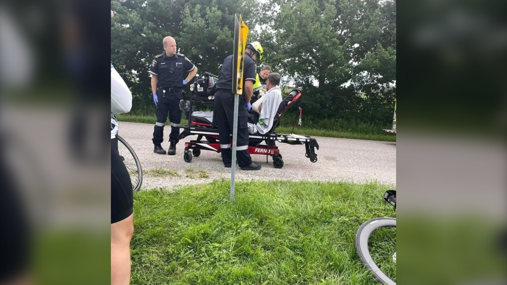 Randy Van Puyenbroeck is treated by EMS after being hit by a pickup truck while cycling in south London on August 14, 2022. (Source: Randy Van Puyenbroeck)