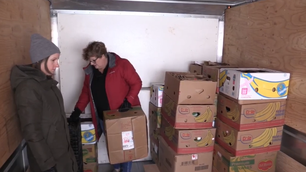 A truck is being filled with donations to the North Huron Food Share during their annual food drive, seen on Nov. 29, 2023. (CTV News) 