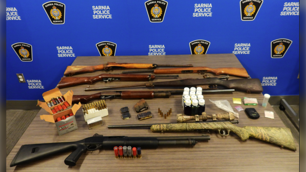 A loaded 12-gauge shotgun, 295 rounds of ammunition, fentanyl and crystal meth were among the items seized during the execution of a search warrant in Sarnia, Ont. on Nov. 23, 2023. (Source: Sarnia Police Service)