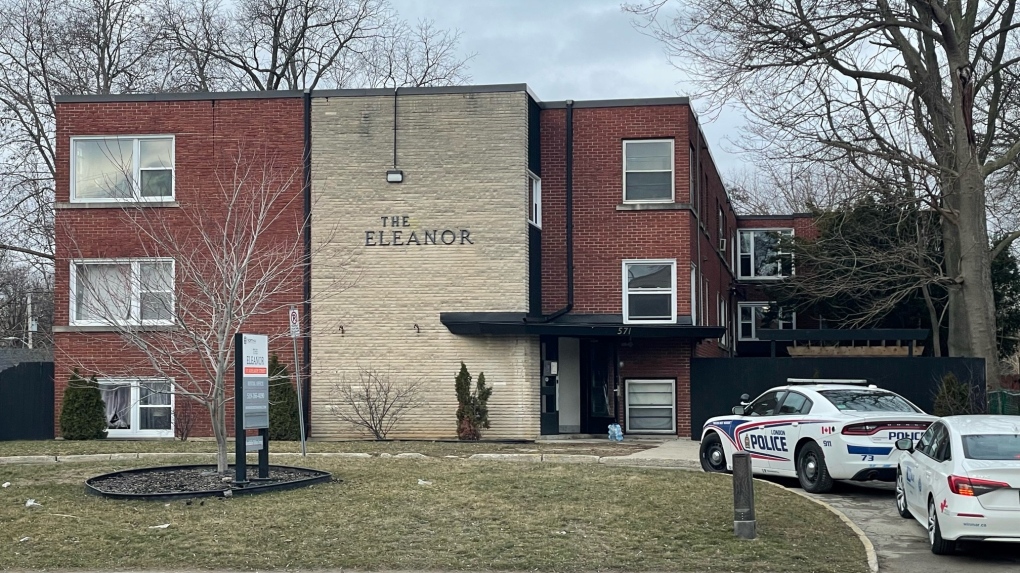 London police vehicles parked outside of a building on Dundas Street after a residential fire on March 24, 2023. (Gerry Dewan/CTV News London)