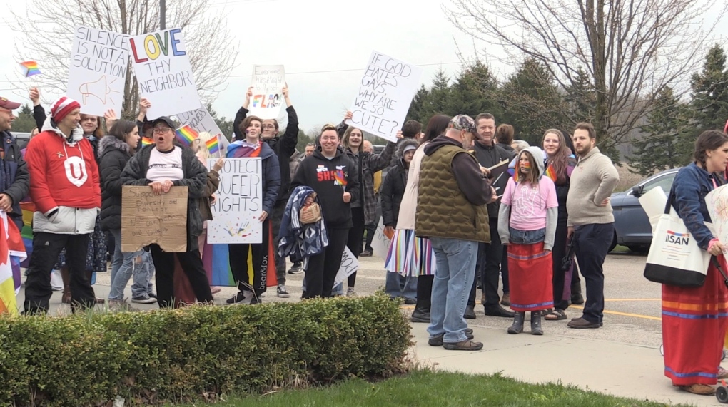 Rally by LGBTQ2S+ community and allies outside Norwich municipal building on April 25, 2023. (Daryl Newcombe/CTV News London)