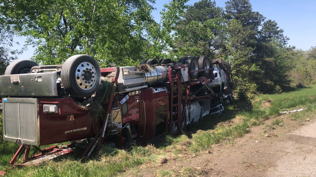The driver of a transport truck suffered minor injuries after a crash involving a second transport truck on Highway 401 in the Municipality of Dutton-Dunwich on May 15, 2023. (Jim Knight/CTV News London)