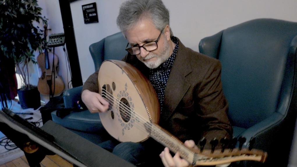 Musician Jaries Bsair played an oud - a traditional Middle Eastern stringed instrument on May 5, 2023. He’s one of the musicians playing in a concert fundraiser Saturday, May 6, 2023, at Aeolian Hall for earthquake relief efforts in Turkey and Syria. (Bryan Bicknell/CTV News London) 