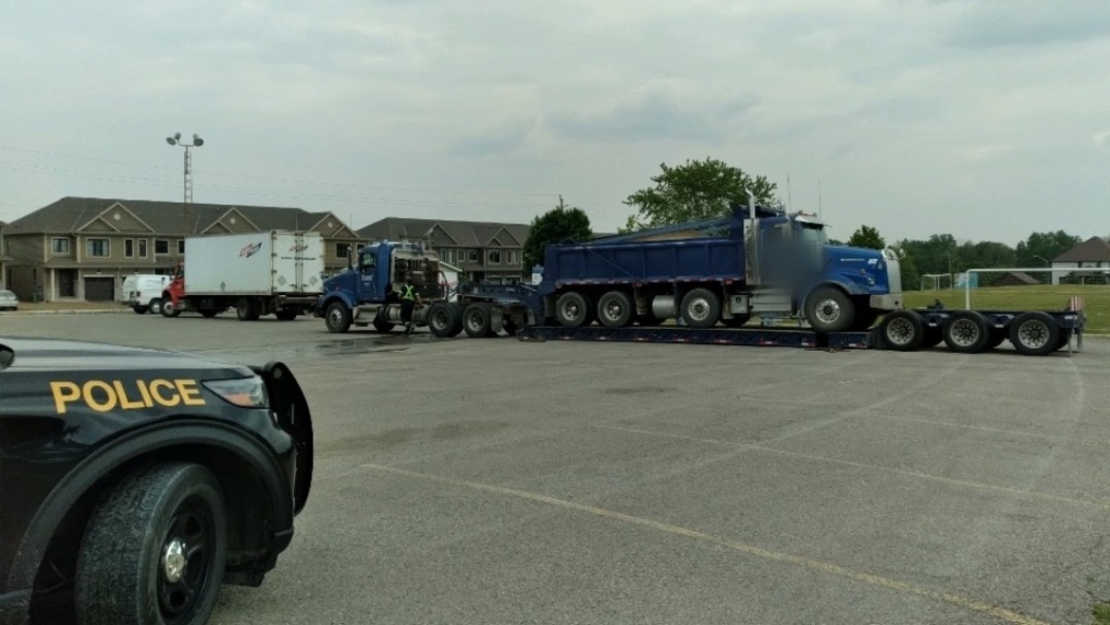 Police say there were 54 inspections, 33 charges, and 25 vehicles placed out of service during a commercial motor vehicle blitz in Norwich, Ont. (Source: OPP West Region/Twitter)
