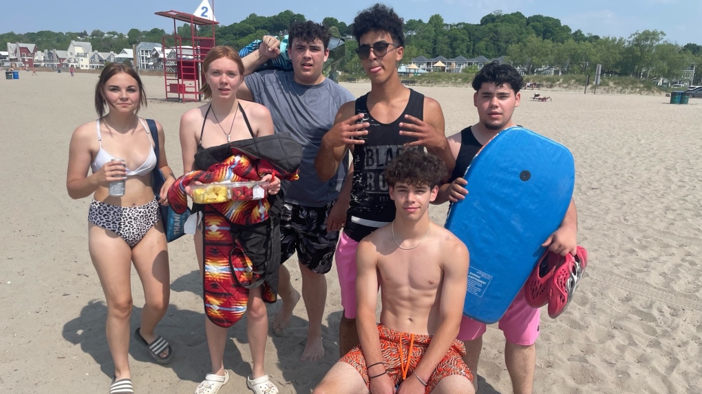 High school students nearing graduation are participating in senior skip day throughout the region. This group from Paris, Ont. was setting up at Port Stanley on June 2, 2023. (Sean Irvine/CTV News London) 