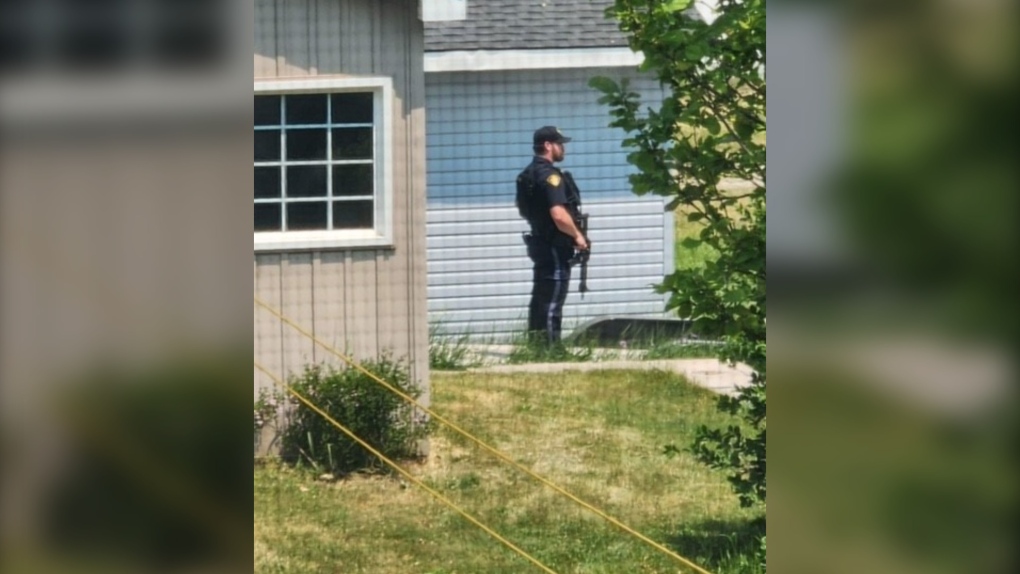 An OPP officer is seen in Londesborough, Ont. during an investigation on June 4, 2023. (Source: Darrell Bergsma)