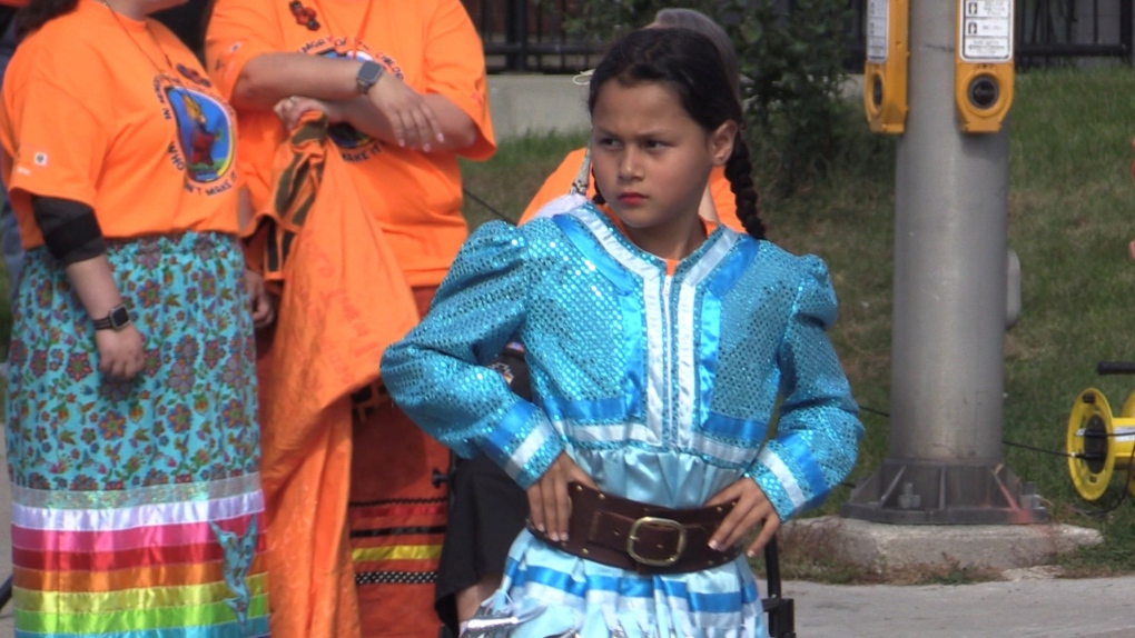 Layla Cornelius, 9, a jingle dress dancer from Oneida, Ont. performs during a Truth and Reconciliation ceremony in London, Ont. on Saturday, Sept. 30, 2023. (Brent Lale/CTV News London)
