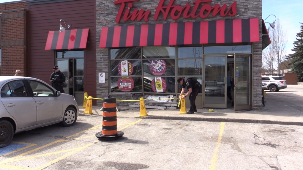 Elderly woman crashes car into Tim Horton's | CTV News