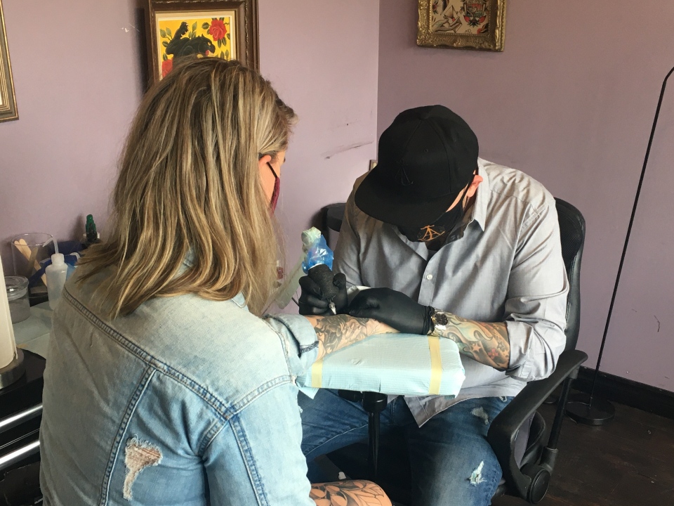 Aaron Allen at this tattoo parlour