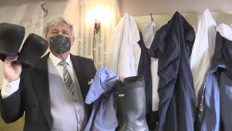Funeral director shows PPE