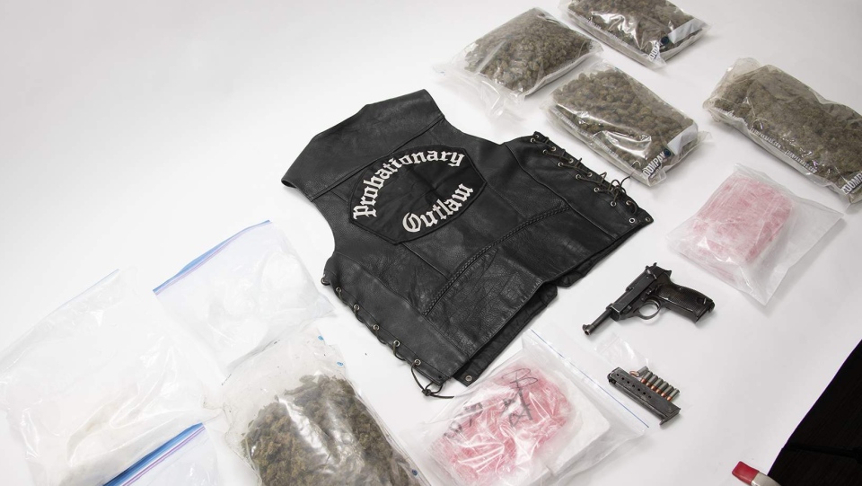 Drugs and Outlaw vest seized
